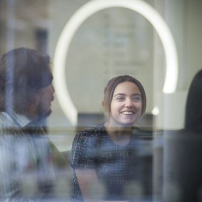 Staff talking in an office